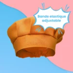 Le Tablier et Toque de Cuisine pour Enfant présente une toque orange avec une bande élastique ajustable et une étiquette "Bande élastique ajustable", sur un fond rose et bleu - idéal pour les jeunes chefs en herbe.